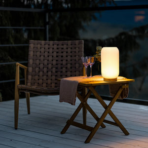 9-inch rechargeable lamp by JHY DESIGN; white ribbed cylindrical 3D-printed lamp glowing on an outdoor table.