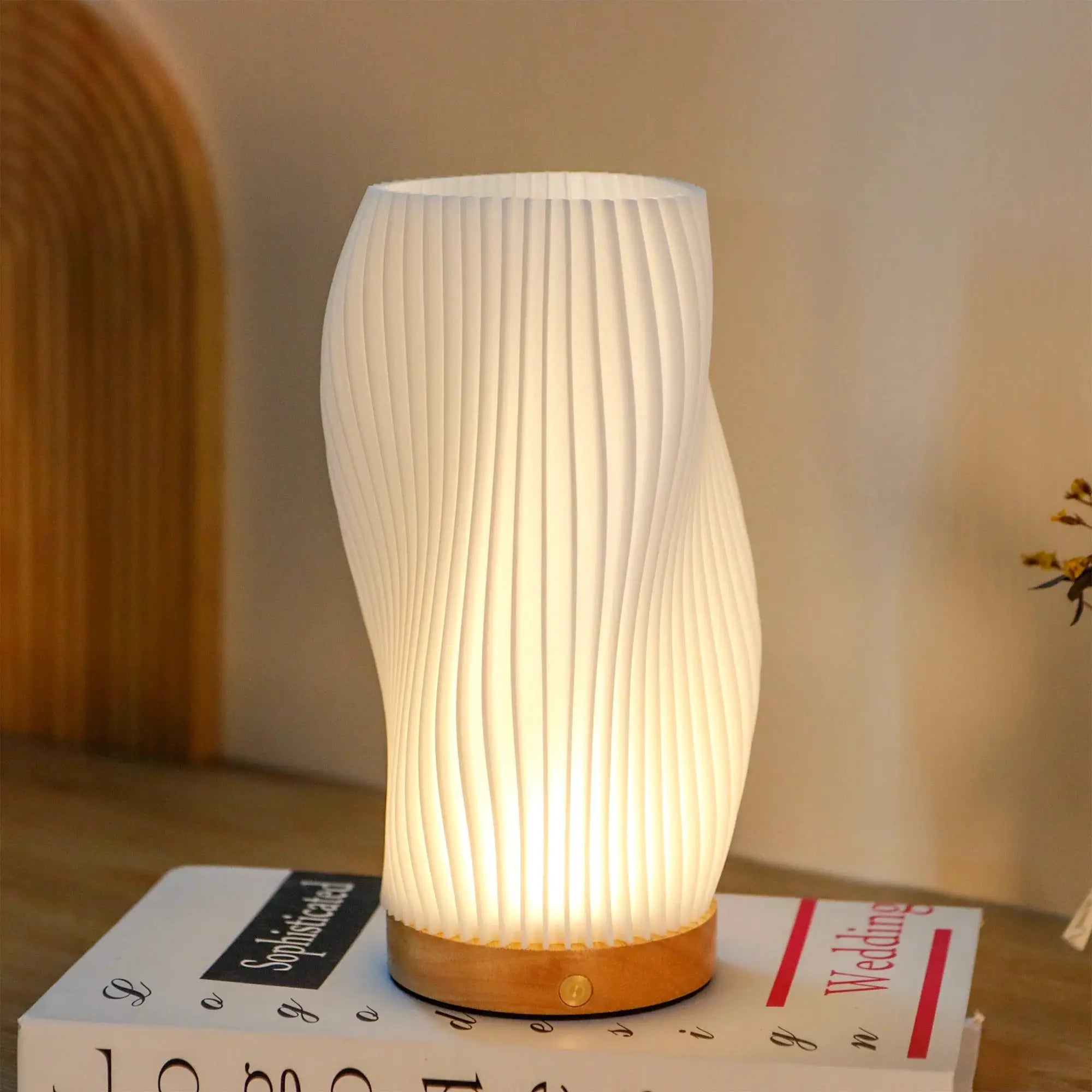 9-inch white spiral ribbed desk lamp on a wooden base, battery-operated.