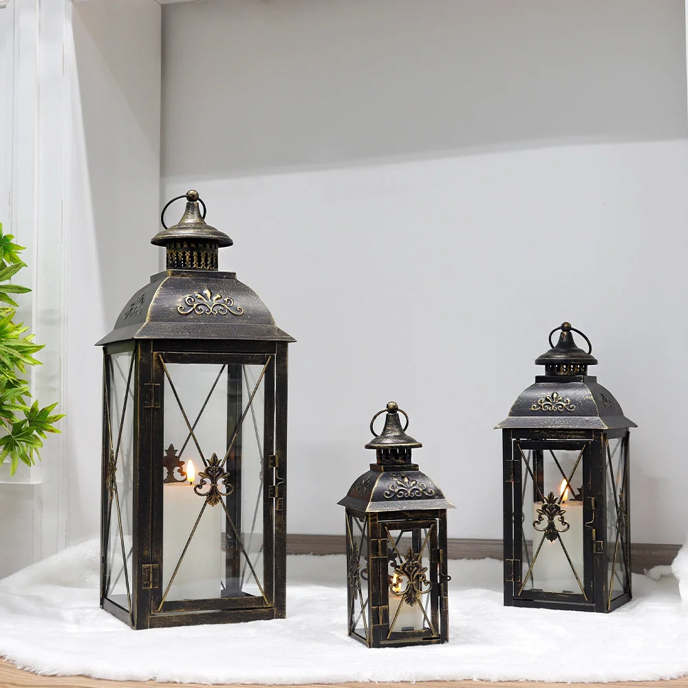 Set of 3 JHY DESIGN hanging candle lanterns in black metal, 19in, 13.5in and 9.5in tall.