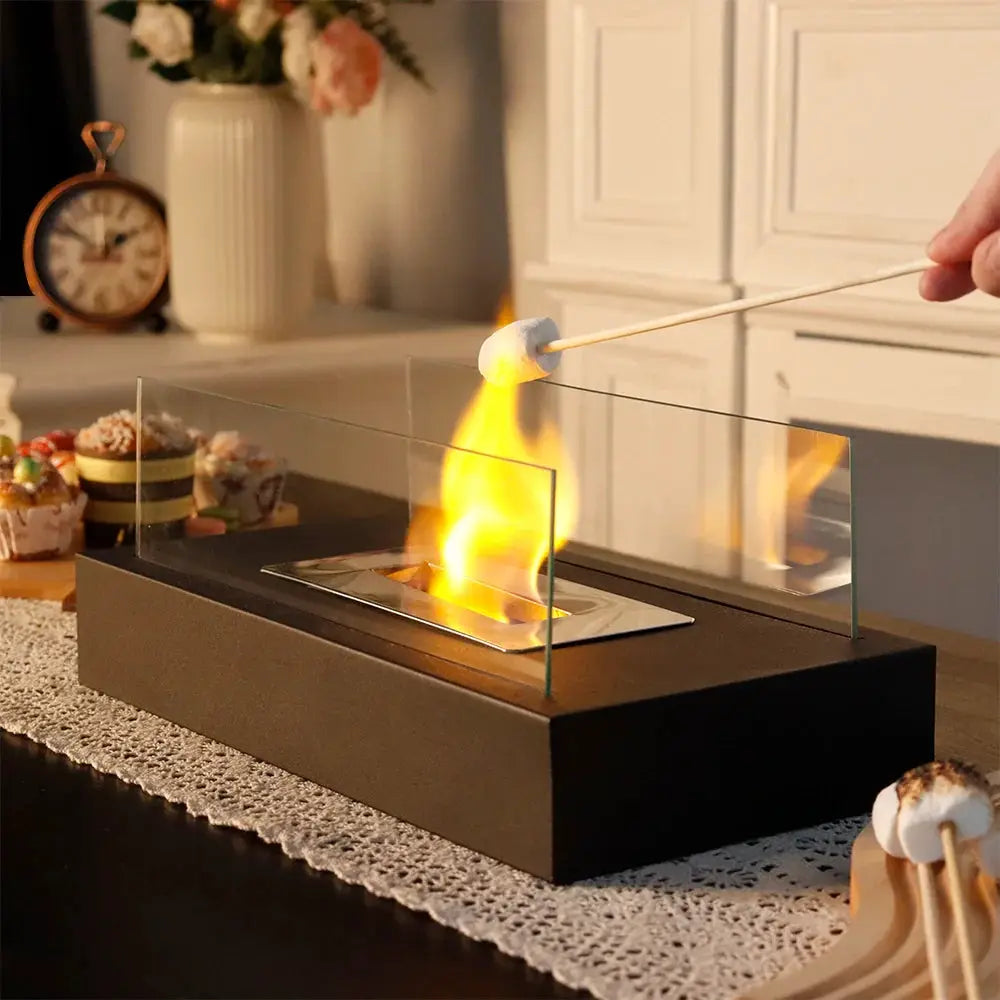 Square Tabletop Fire Bowl Pot with two-sided glass panels on a black base, gel/ethanol fireplace.