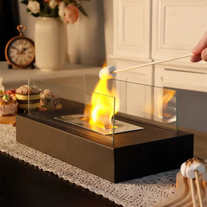 Square Tabletop Fire Bowl Pot with two-sided glass panels on a black base, gel/ethanol fireplace.