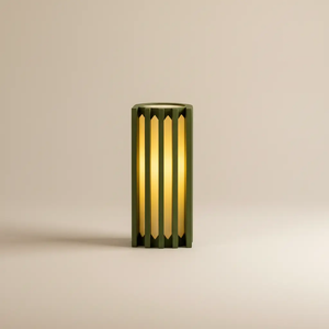 Radiator Table Lamp by Terra Labs; green metal frame with vertical slats surrounding warm amber light