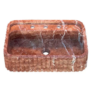 Red travertine wall-mount bathroom sink with ribbed texture by Villohome