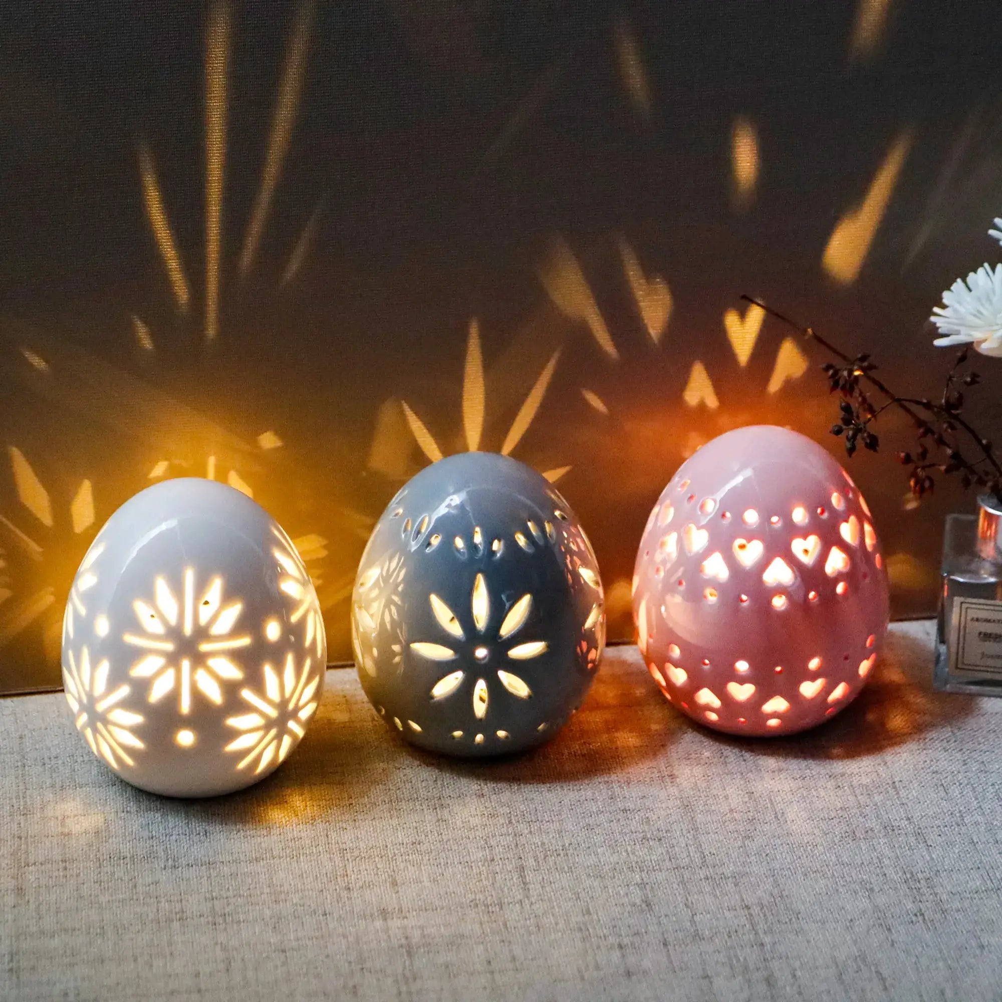Set of 3 ceramic egg lamps, 4" high, pastel colors with carved floral cutouts, battery-operated, by JHY DESIGN