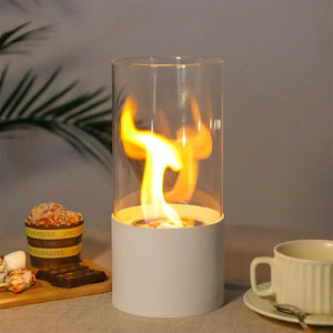 Portable tabletop firepit, cylindrical glass enclosure with white base, by JHY DESIGN, flickering flame