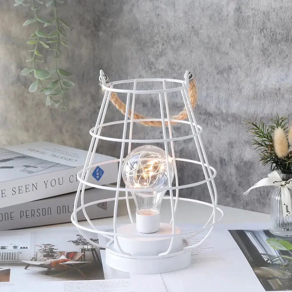 8.5in cordless accent lamp with Edison-style bulb in white metal cage