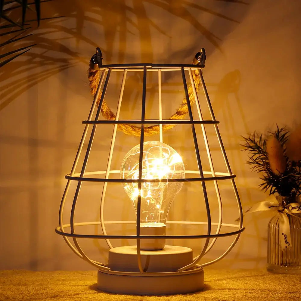 8.5in cordless accent lamp with Edison-style bulb in a white metal cage with a rope handle