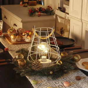 8.5-inch white cordless accent light with Edison-style bulb inside a wire cage, on a festive dining table by JHY DESIGN