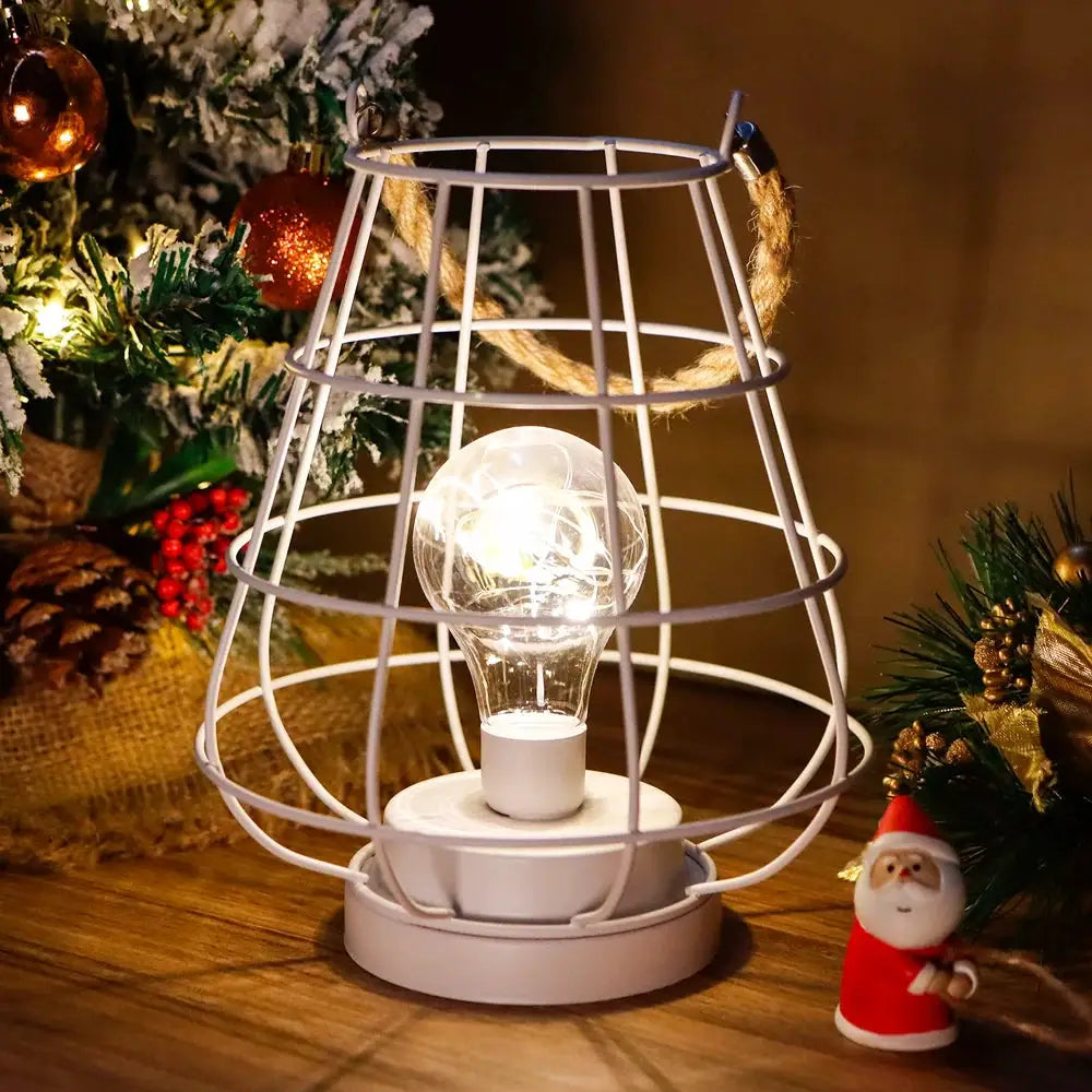 8.5-inch cordless accent lamp with Edison-style bulb in a white wire cage by JHY DESIGN