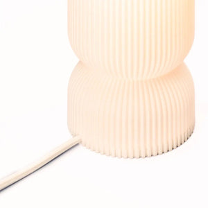 Stance Table Lamp by Terra Labs; peach ribbed pleated base with fabric cord