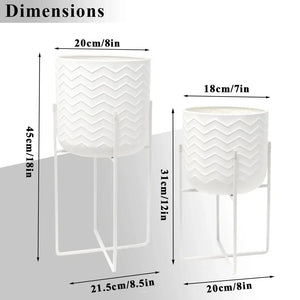Set of 2 white planters with stands; large 45cm tall and small 31cm tall, zigzag textured surfaces.