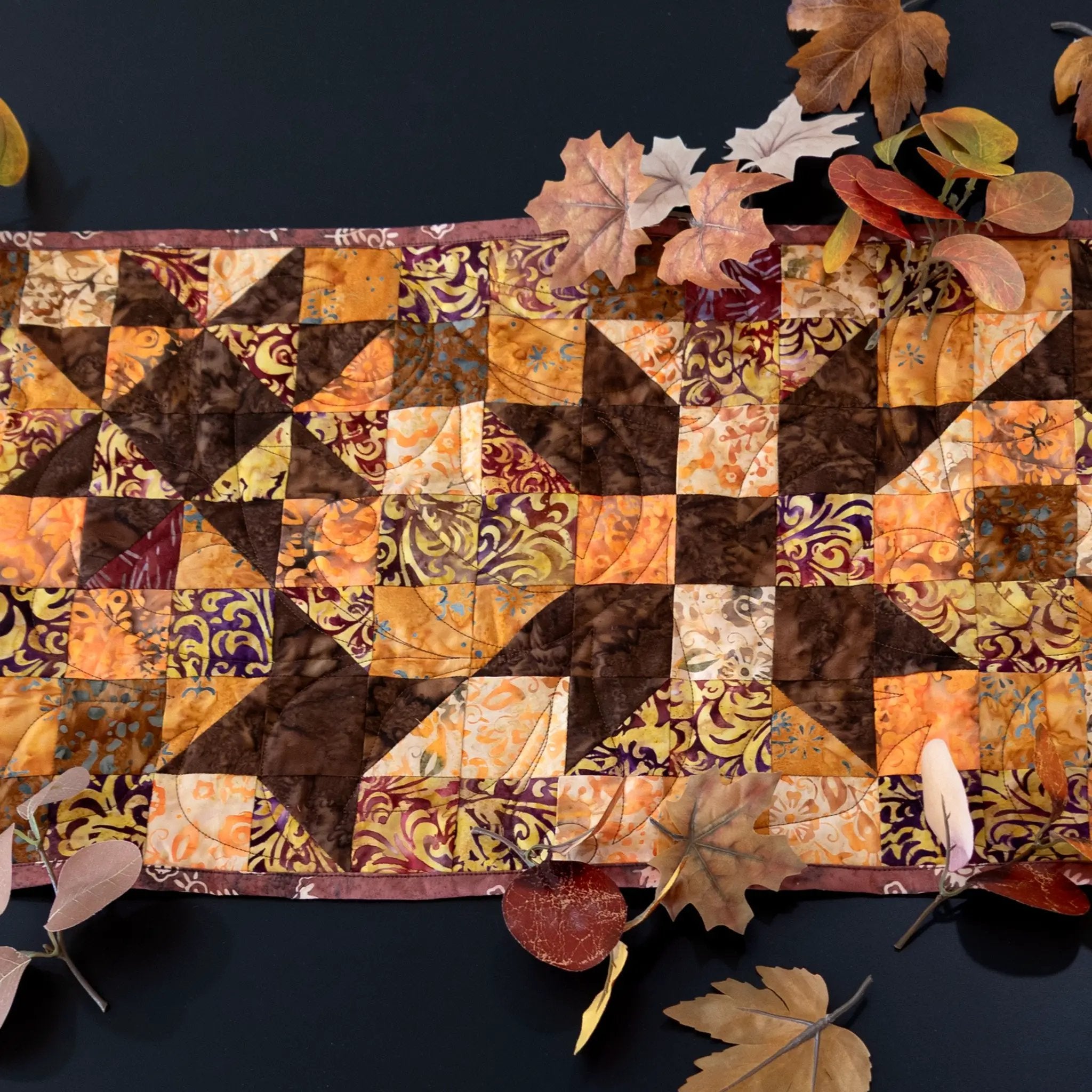 Quilt kit Standout Stars in Falling Leaves table runner, cotton precut by Block Party Quilt Co.