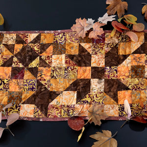 Quilt kit Standout Stars in Falling Leaves table runner, cotton precut by Block Party Quilt Co.