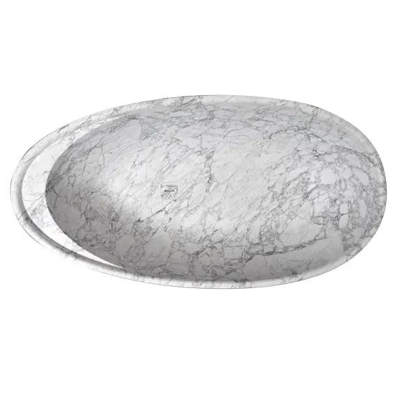 Statuario White Marble Bathtub by Villohome, hand-carved from a solid marble block, oval bathtub design