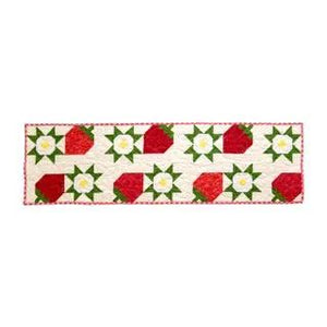 Strawberry Table Runner Kit by Block Party Quilt Co, quilt kit with red strawberries on white and pink border
