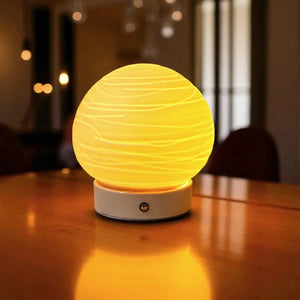 Ceramic ball planet lamp by JHY DESIGN, cordless portable yellow glow table lamp.