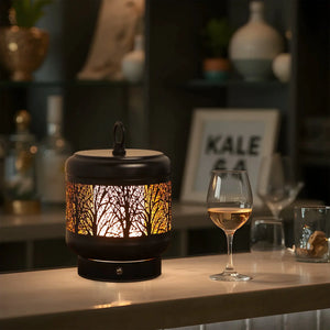 JHY DESIGN 4000mAh rechargeable desk lamp on table, black metal with warm amber glow.