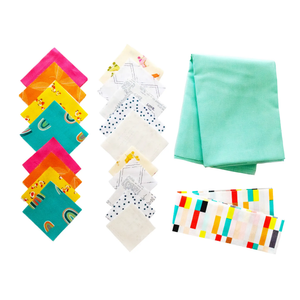 Linked Hearts Quilted Table Runner Kit with colorful fabric squares and a teal folded fabric panel