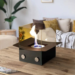 8-inch H Portable Tabletop Fireplace by JHY DESIGN with glass wind guard and black base.