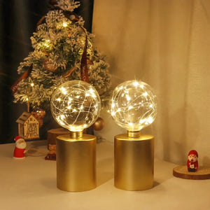 8-inch tall gold battery-powered table lamps (set of 2) by JHY DESIGN with clear glass globe string lights.