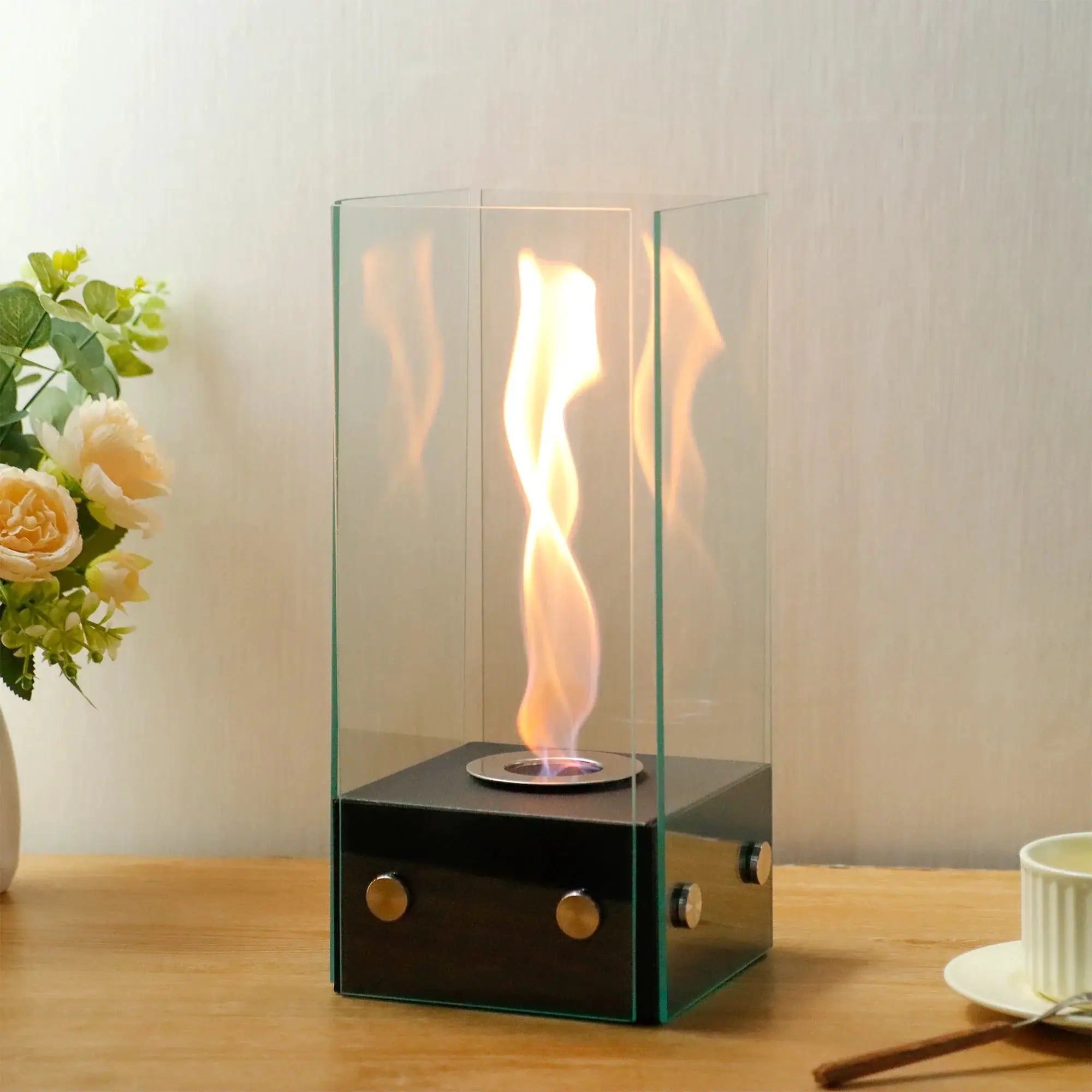 Rectangular glass tabletop firepit by JHY DESIGN; clear glass panels, black base
