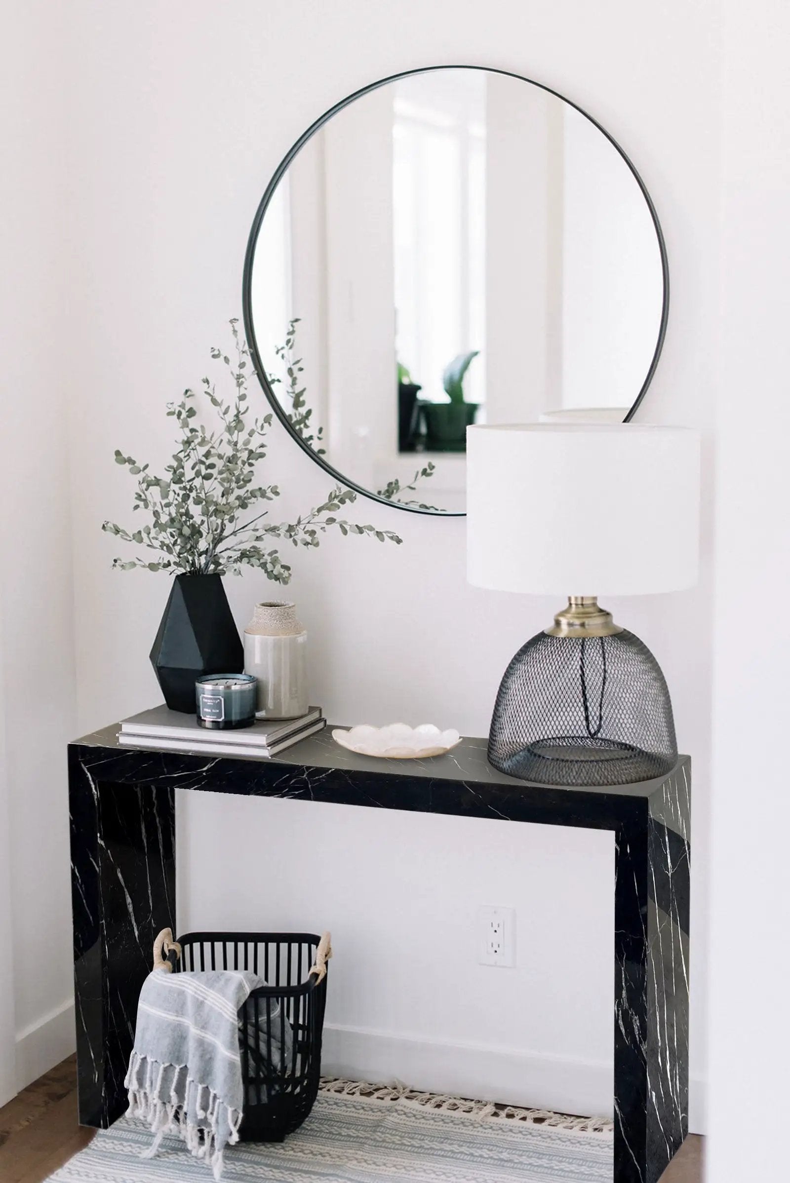 Toros Black Marble Rectangular Console by Villohome; polished black marble with white veining and a round wall mirror.