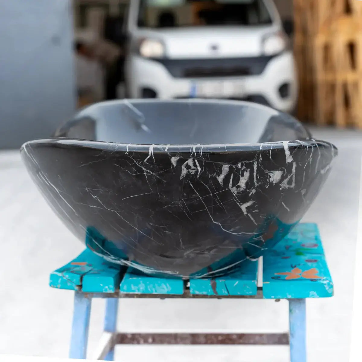 Toros black marble vanity sink, above-counter vessel with gondola design by Villohome.