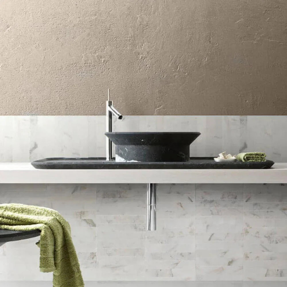 Villohome black polished marble above-counter bathroom vessel sink on white vanity with chrome faucet