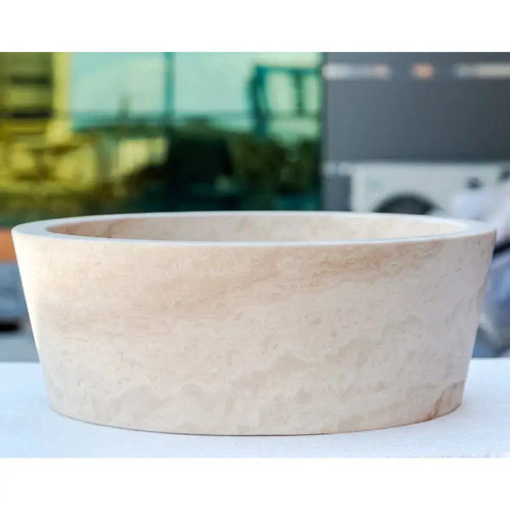 Troia Light Travertine stone bathroom sink by Villohome, tapered round above-counter vessel, 16in dia