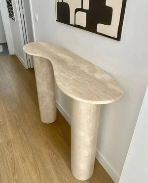 Troia Light Travertine Designer Console by Villohome; beige honed travertine with oval top and two cylindrical legs.