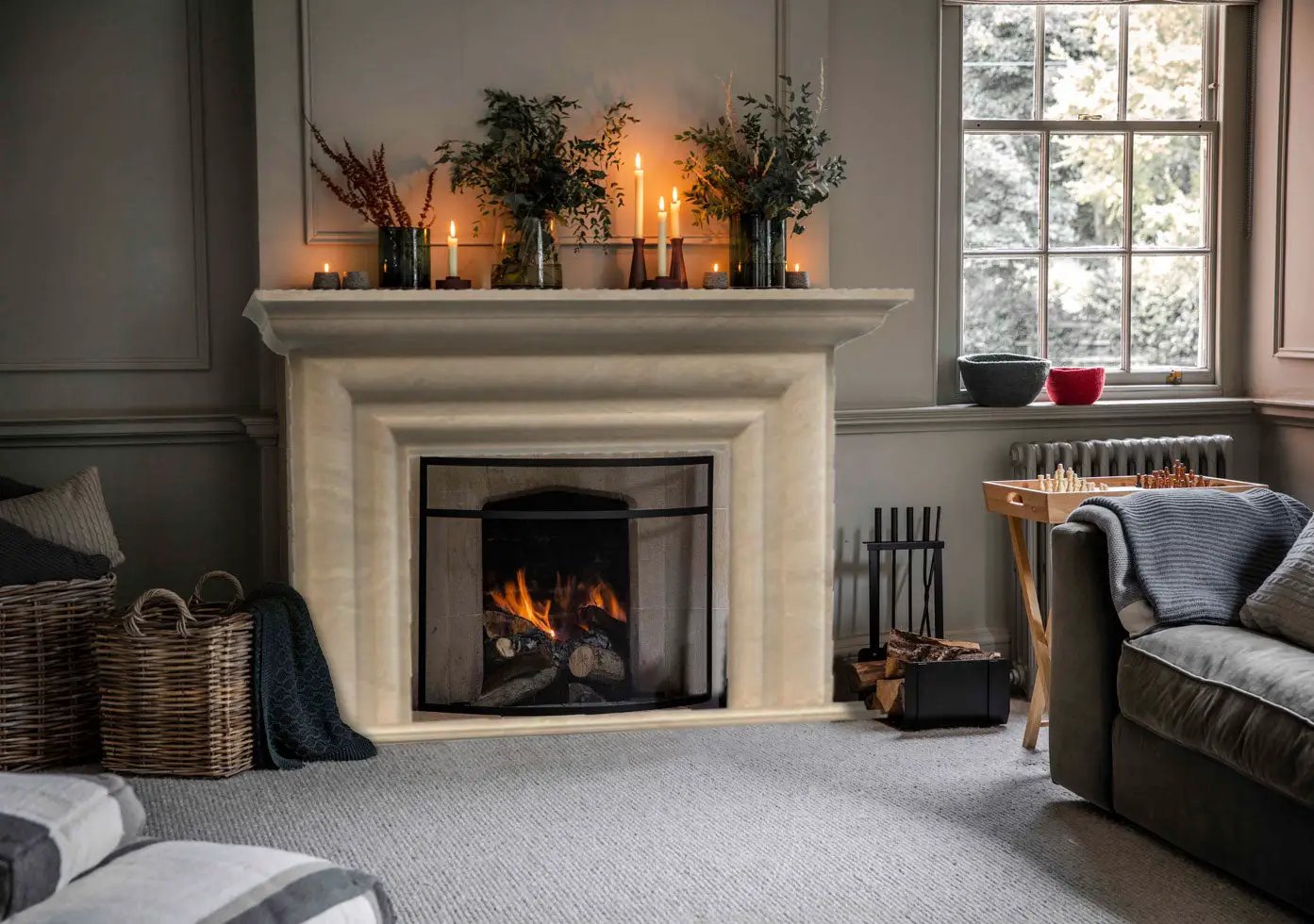 Troia Light Travertine hand-carved fireplace surround by Villohome, light beige stone