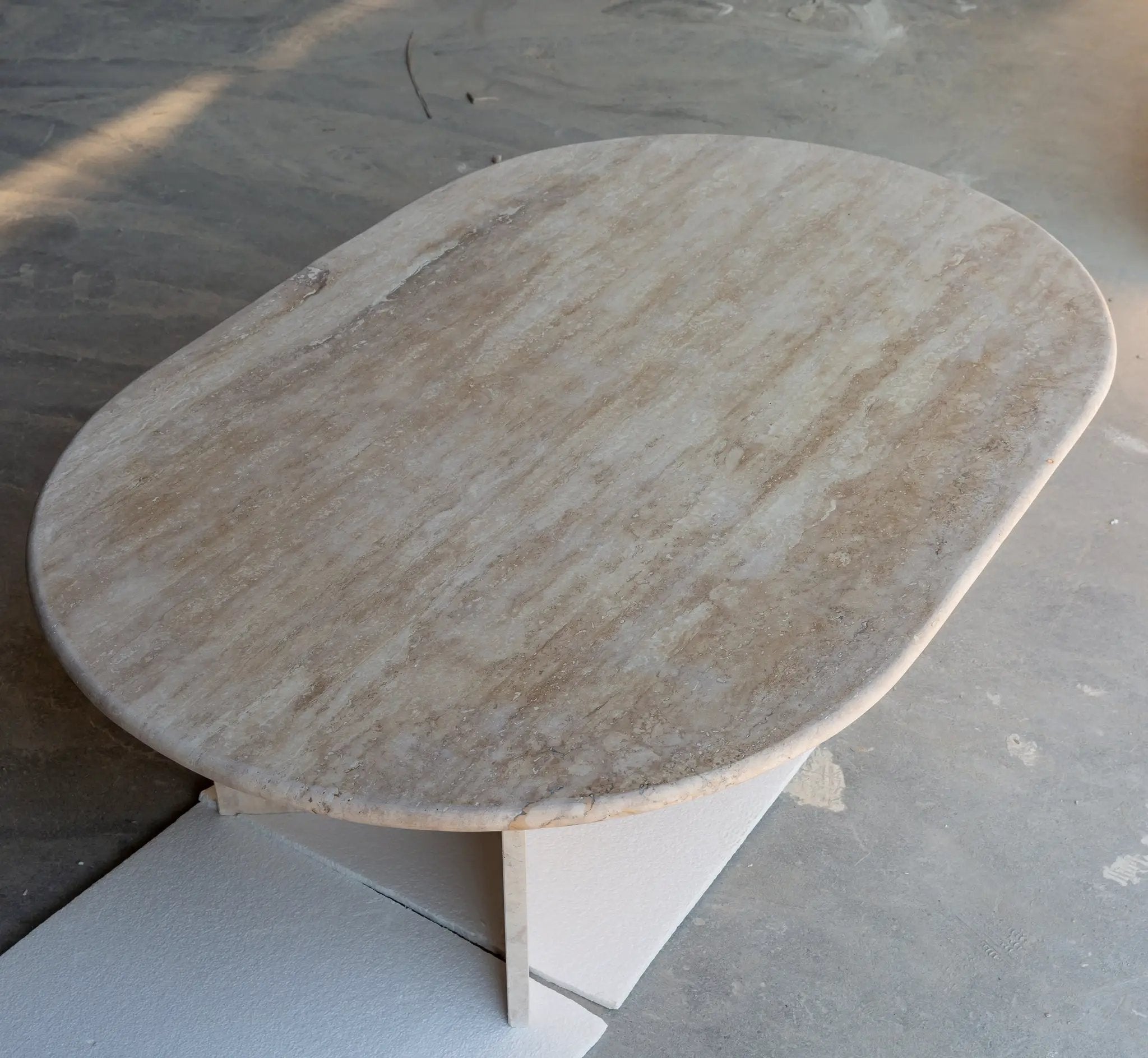 Troia light travertine oval coffee table with beige-veined polished top