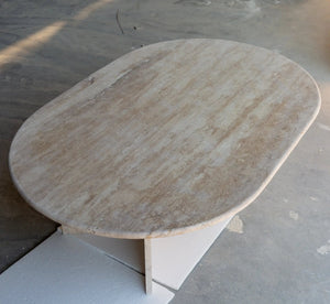 Troia light travertine oval coffee table with beige-veined polished top