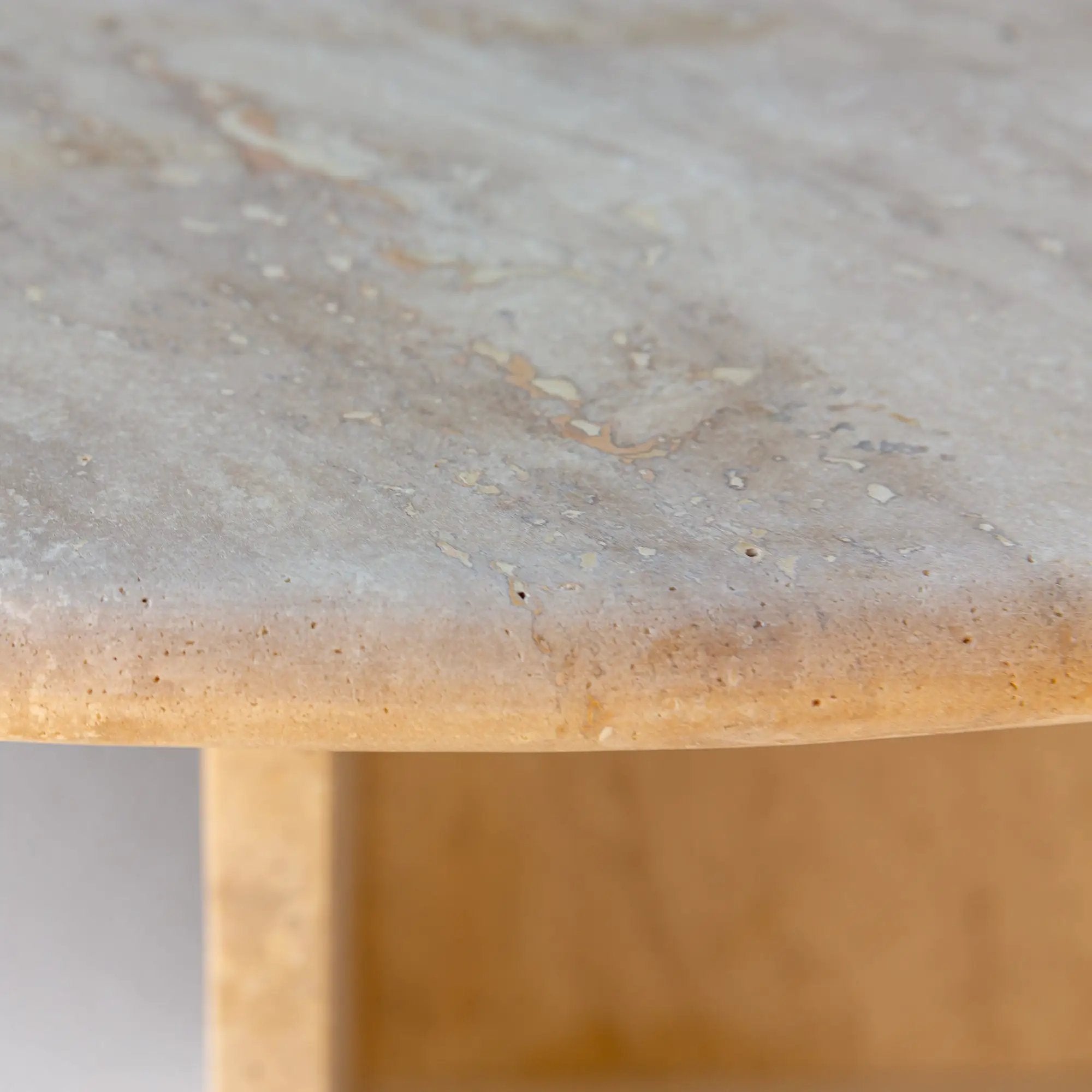 Troia Light Travertine oval coffee table by Villohome; warm beige polished travertine top