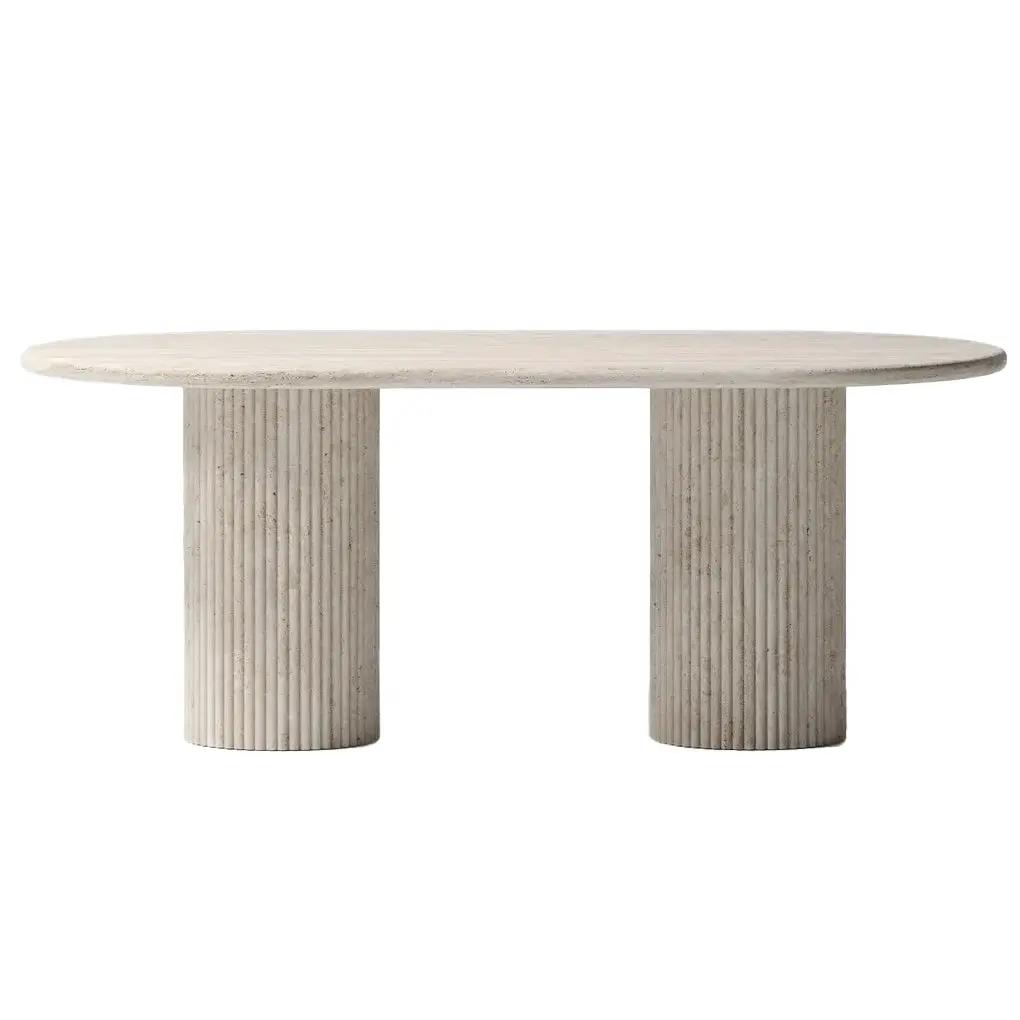 Troia Light Travertine oval dining table with two fluted round legs in pale beige travertine.