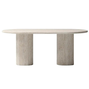 Troia Light Travertine oval dining table with two fluted round legs in pale beige travertine.