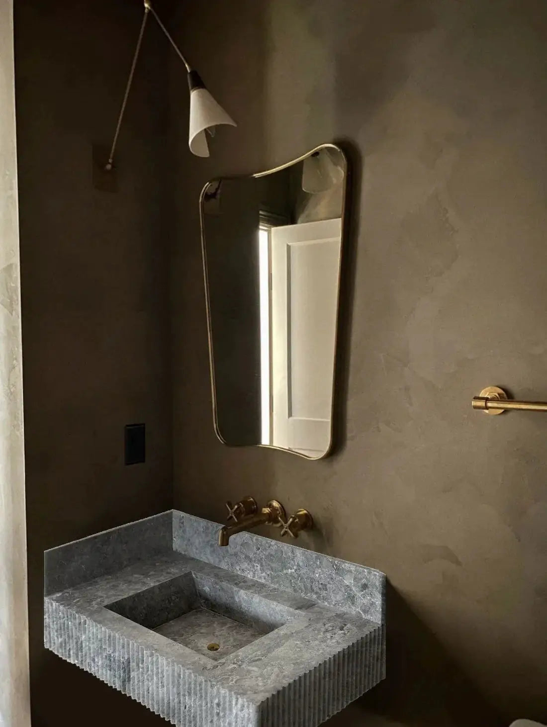 Tundra Gray Marble wall-mount bathroom sink by Villohome with 6-inch backsplash, gray ribbed stone and brass faucet