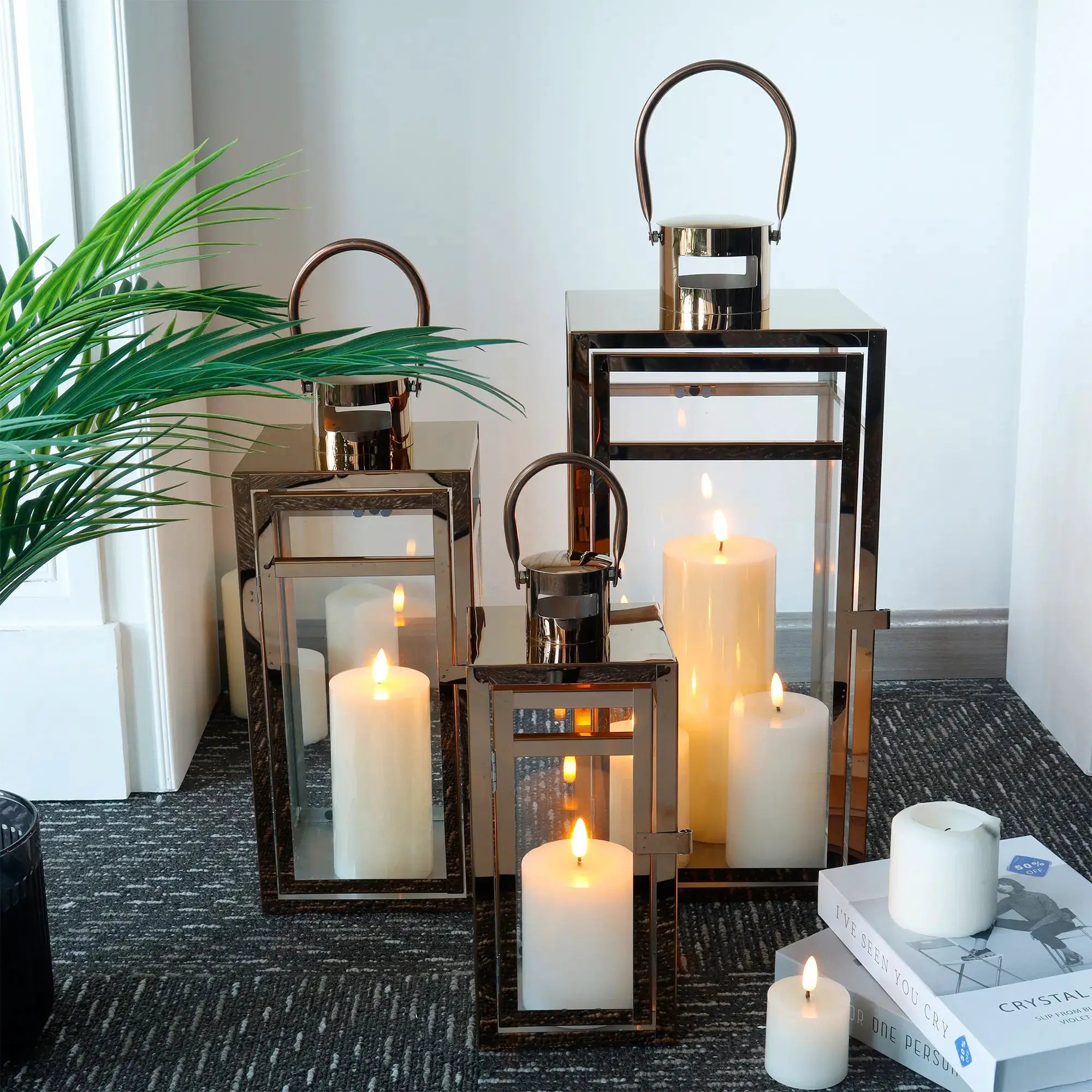 Set of 3 rose-gold stainless steel decorative candle lanterns by JHY DESIGN with glass panels