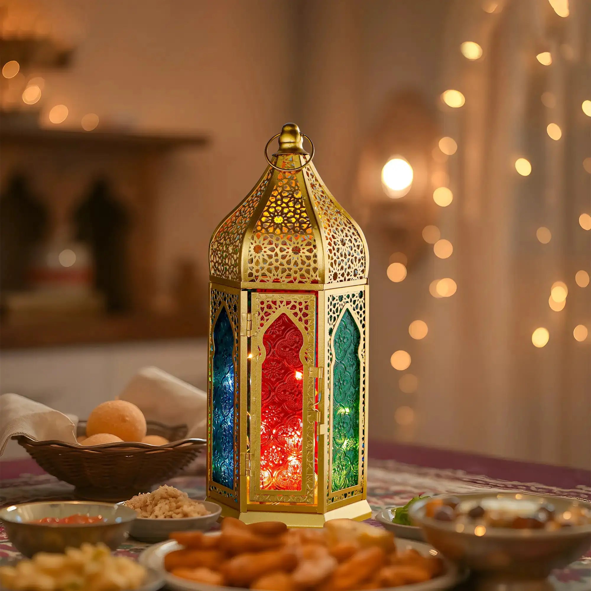 12-inch gold hexagonal Moroccan candle lantern with colorful red, blue and green glass panels