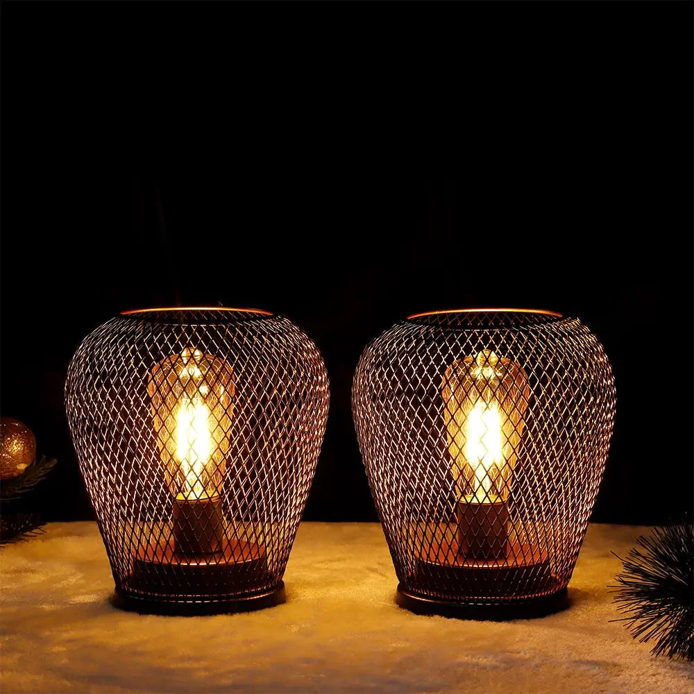6.7in tall battery-powered outdoor table lamps (set of 2) with mesh metal cages and warm amber glow by JHY DESIGN