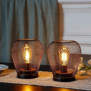 6.7-inch tall battery-powered outdoor table lamp set of 2 by JHY DESIGN with metal mesh cages.