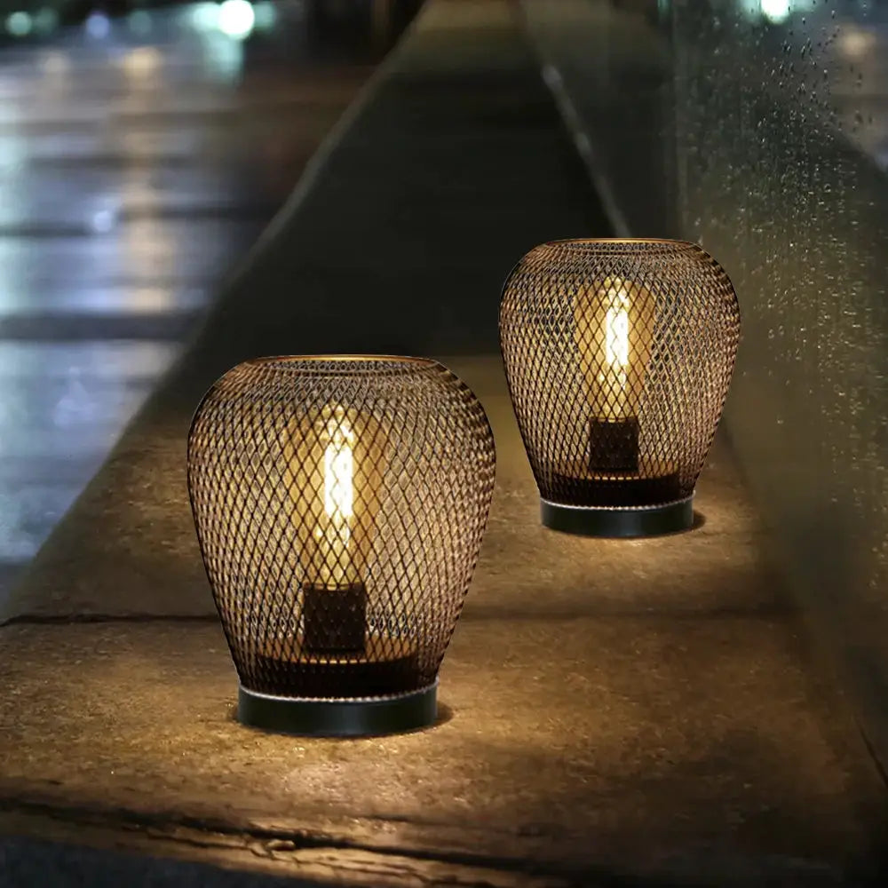 6.7-inch tall battery-powered outdoor table lamp set of 2 with copper mesh cages by JHY DESIGN