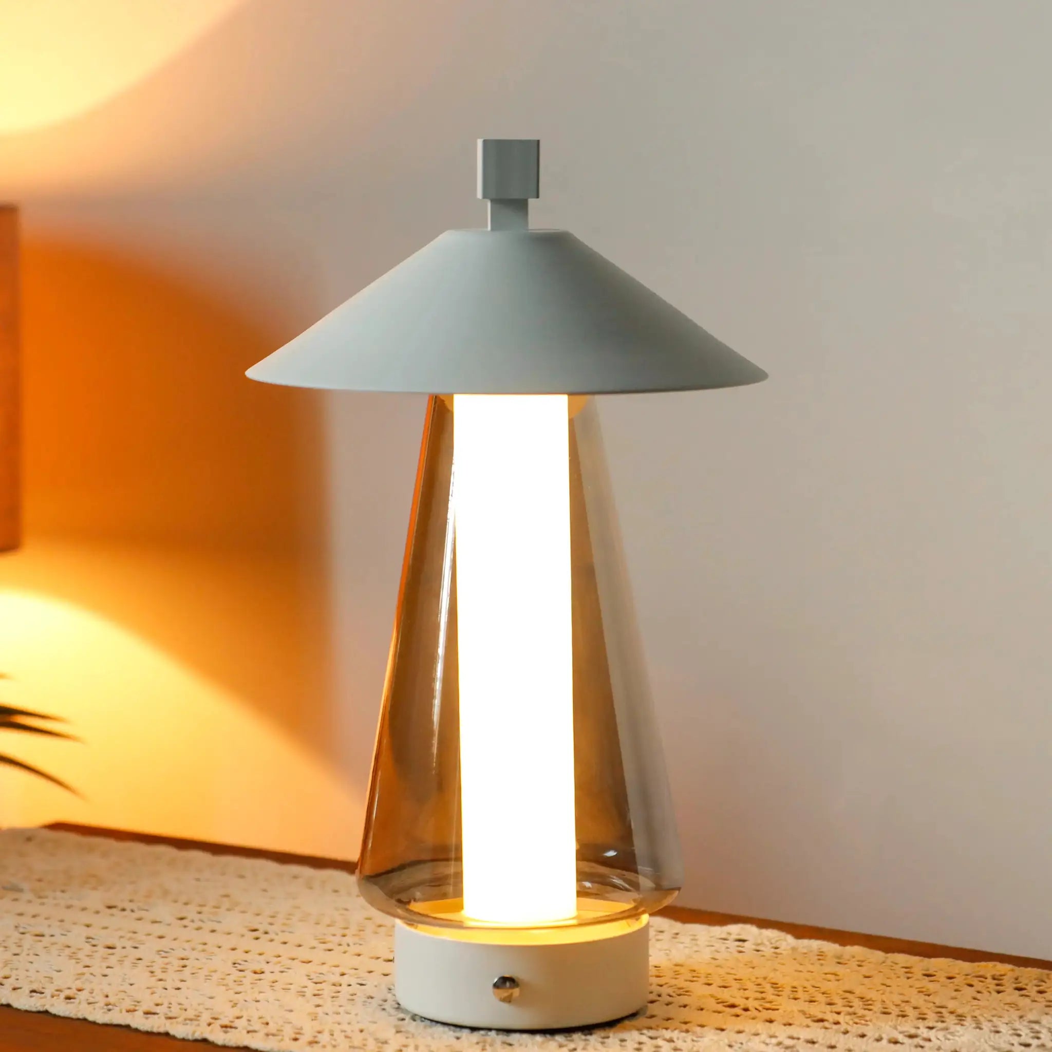 3-Way Dimmable bedside lamp with gray umbrella shade and white base, 12-inch tall.
