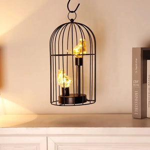 12-inch tall JHY DESIGN battery-operated birdcage lamp with two warm LED bird lights inside a black metal cage