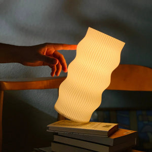 Wub table lamp by Terra Labs; natural wood veneer, curved sculptural form.