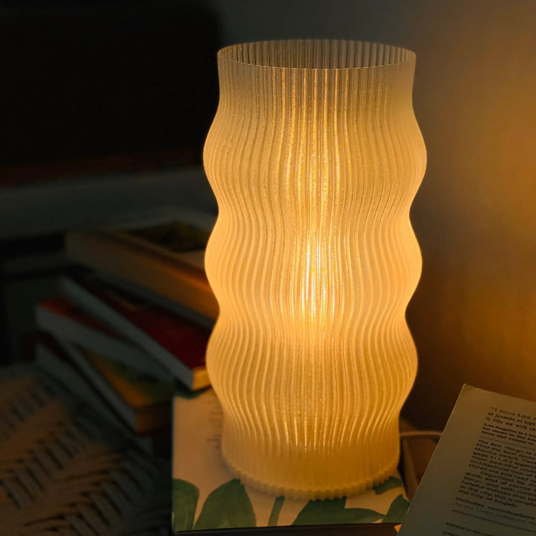 Yuji table lamp by Terra Labs with a ribbed beige shade