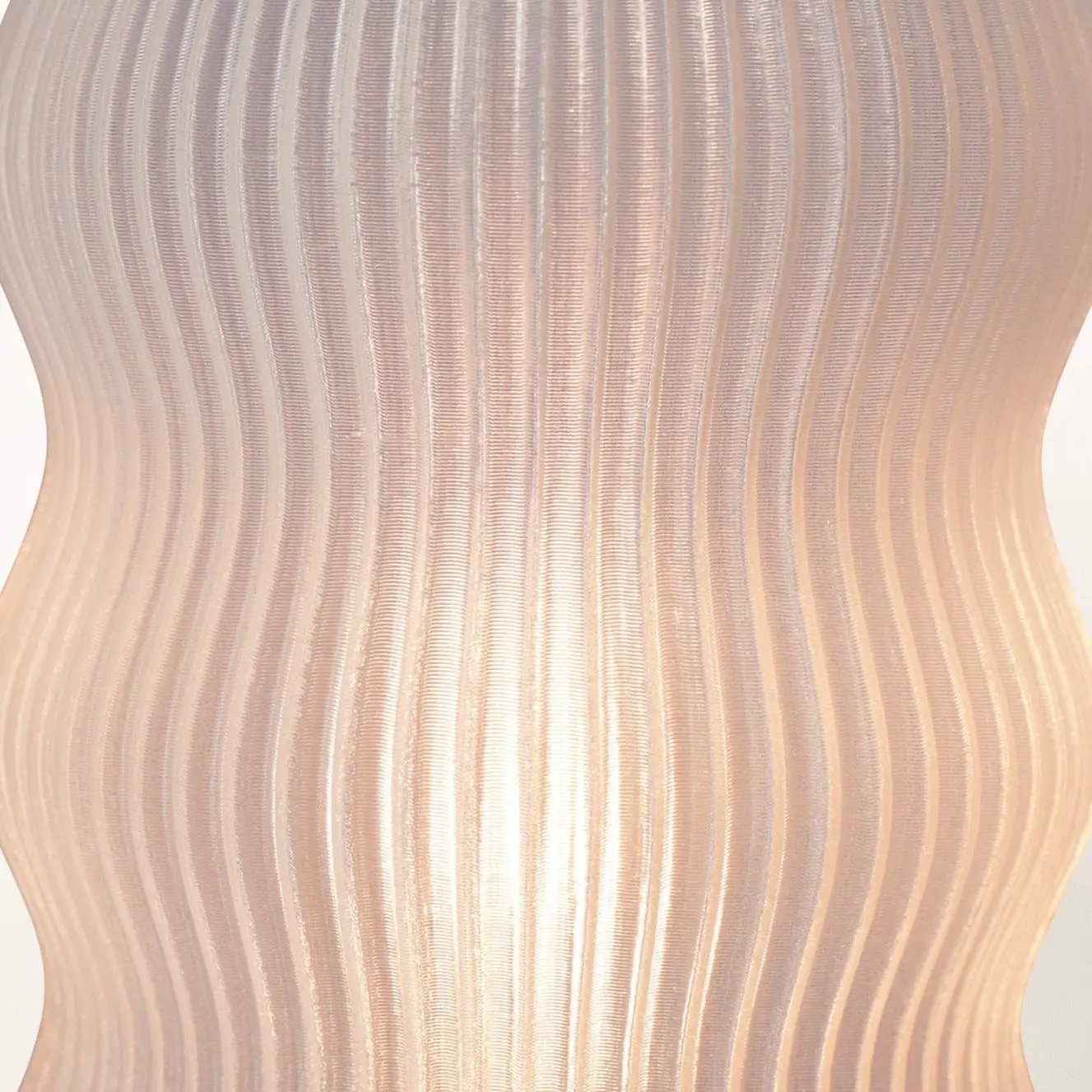 Yuji table lamp by Terra Labs; pink ribbed fabric shade with curved sculpted sides