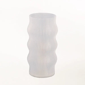 Yuji Table Lamp by Terra Labs; white ribbed glass with a curvy sculptural silhouette